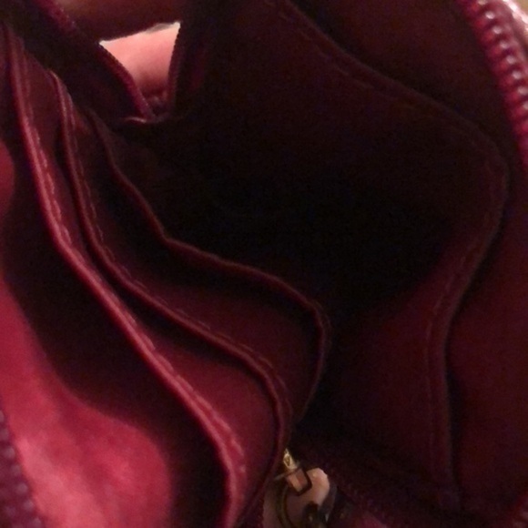 Coach pink python embossed wristlet bag